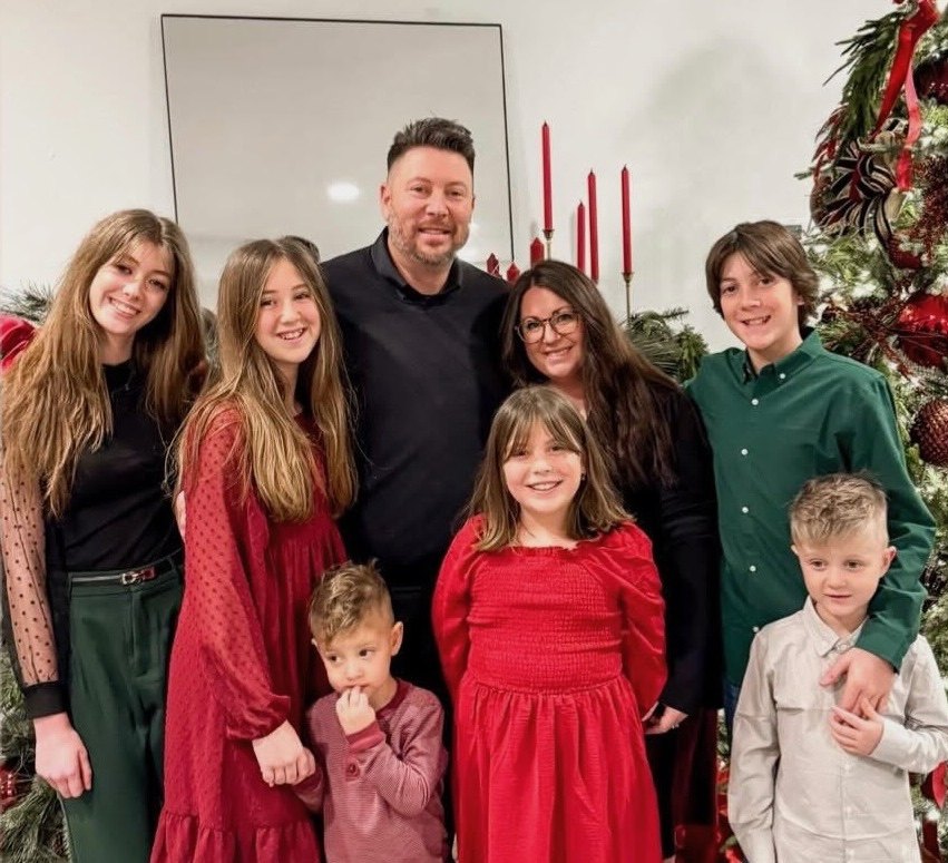 Clint Andrus, owner of Andrus Window Co., with his family in North Texas